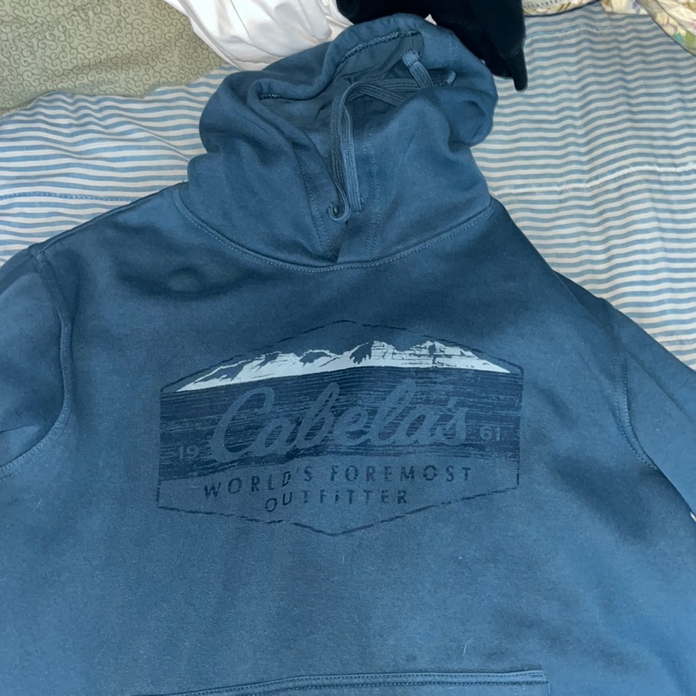 Blue Cabelas sweatshirt